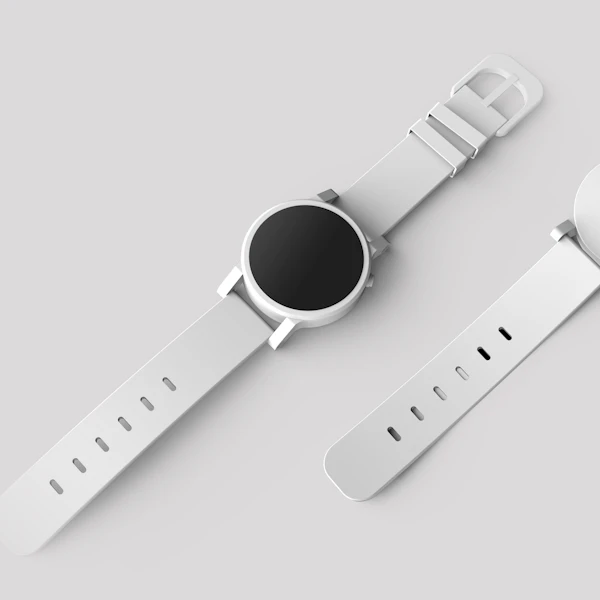 Dos relojes blancos sobre fondo gris claro